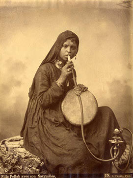 Girl smoking hookah in the early 1900s